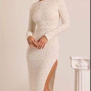 Selling this oh Polly pearl embellished dress. US size 2. Never worn.